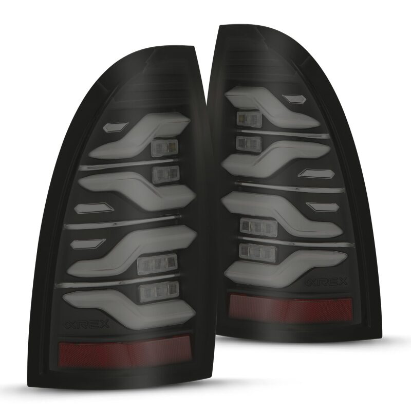 AlphaRex 680060 - ARX680060 - AlphaRex 05-15 Toyota Tacoma LUXX LED Taillights Blk w/Activ Light/Seq Signal - Shipped in Europe - Tuningsupply.com