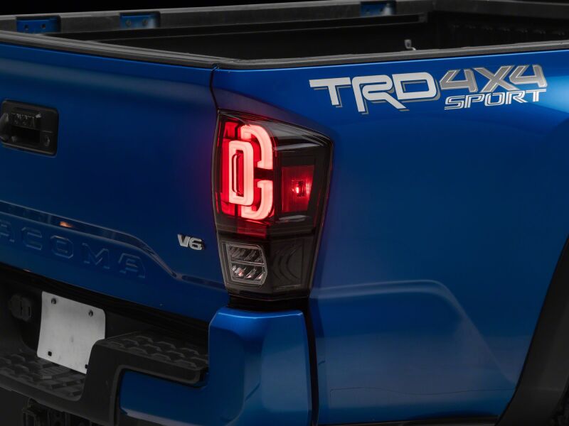 Raxiom TT30331 - RAXTT30331 - Raxiom 16-23 Toyota Tacoma XW Series Sequential LED Tail Lights- Black Housing- Clear Lens - Shipped in Europe - Tuningsupply.com