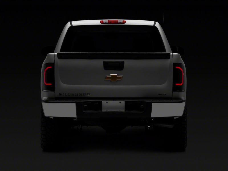 Raxiom S150366 - RAXS150366 - Raxiom 07-14 Chevrolet Silverado 1500 Axial Series LED Tail Lights- Black Housing (Smoked Lens) - Shipped in Europe - Tuningsupply.com