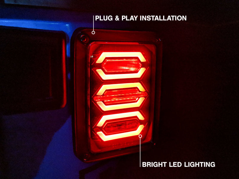 Raxiom J106751 - RAXJ106751 - Raxiom 07-18 Jeep Wrangler JK LED Tail Lights- Black Housing (Smoked Lens) - Shipped in Europe - Tuningsupply.com