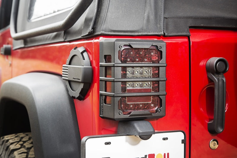 Rugged Ridge 11226.05 - RUG11226.05 - Rugged Ridge 07-18 Jeep Wrangler JK Black Elite Tail Light Guards - Shipped in Europe - Tuningsupply.com