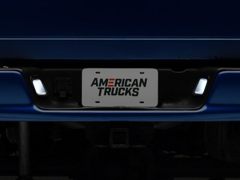 Raxiom R109176 - RAXR109176 - Raxiom 03-18 Dodge RAM 1500 Axial Series LED License Plate Lamps - Shipped in Europe - Tuningsupply.com