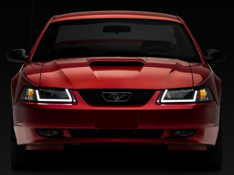 Raxiom 422712 - RAX422712 - Raxiom 99-04 Ford Mustang Axial Series Headlights w/ LED Bar- Black Housing (Clear Lens) - Shipped in Europe - Tuningsupply.com