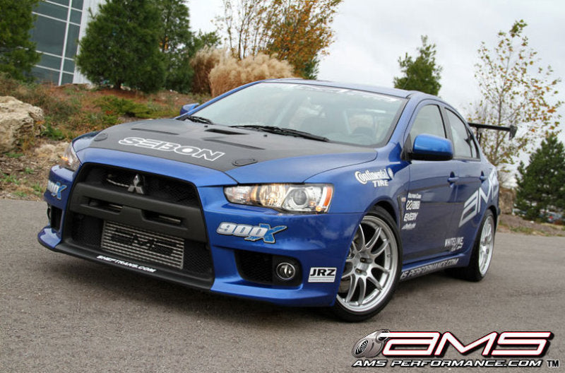 AMS - AMSAMS.04.09.0001-1 - AMS Performance 08-15 Mitsubishi EVO X Front Mount Intercooler w/Modular Cast End Tanks & Logo - Shipped in Europe - Tuningsupply.com