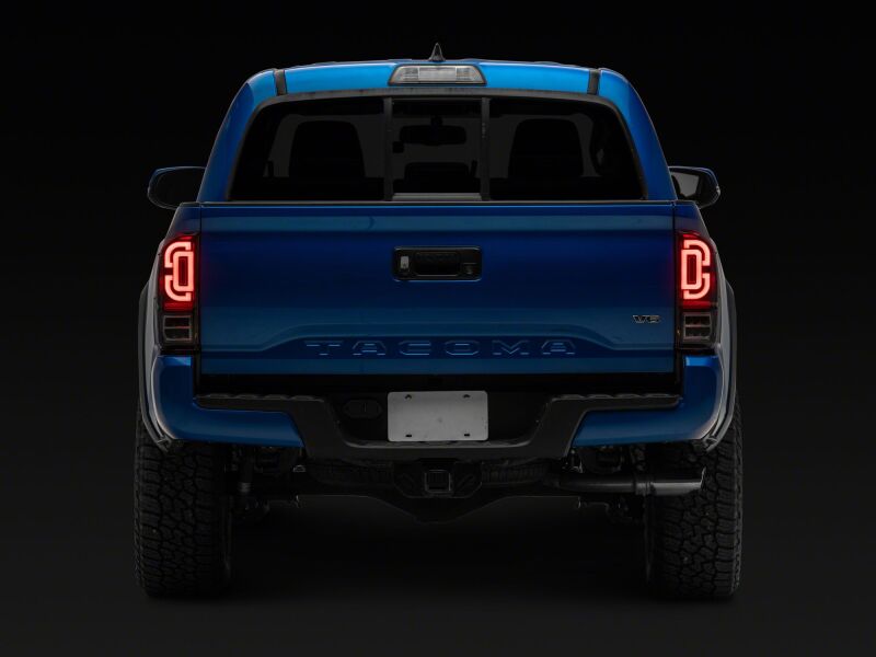 Raxiom TT30331 - RAXTT30331 - Raxiom 16-23 Toyota Tacoma XW Series Sequential LED Tail Lights- Black Housing- Clear Lens - Shipped in Europe - Tuningsupply.com