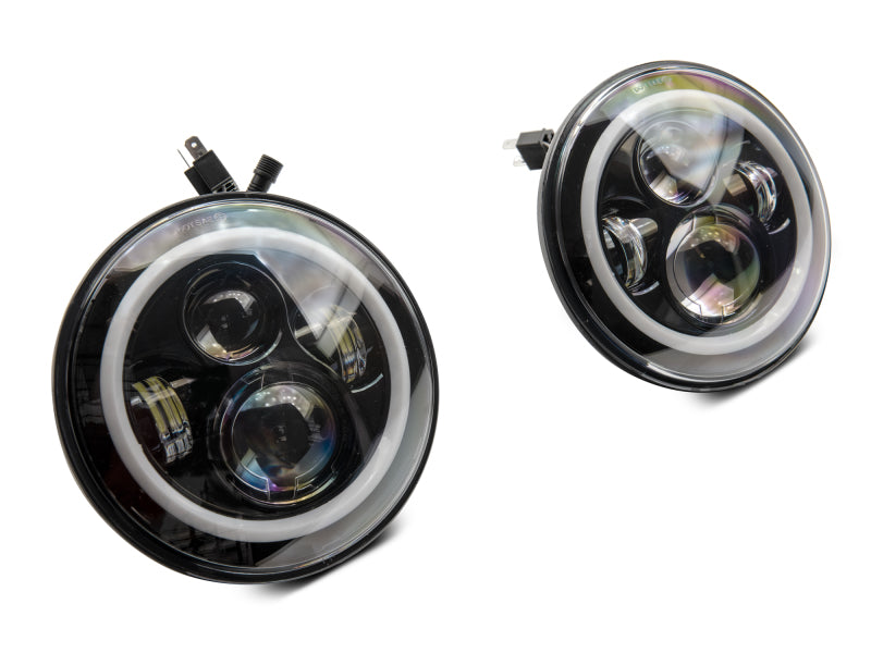Raxiom J142665 - RAXJ142665 - Raxiom 97-18 Jeep Wrangler TJ/JK Axial 7-Inch LED Headlights w/RGB Halo- Black Housing (Clear Lens) - Shipped in Europe - Tuningsupply.com
