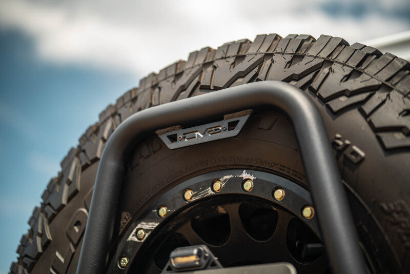 DV8 Offroad TCJL-14 - DVETCJL-14 - DV8 18-25 Jeep Wrangler JL Body Mounted Tire Carrier - Shipped in Europe - Tuningsupply.com