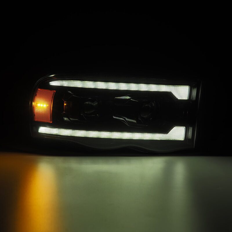 AlphaRex 880572 - ARX880572 - AlphaRex 02-05 Dodge Ram 1500 PRO-Series Projector Headlights Plank Style Alpha Black w/Seq Signal - Shipped in Europe - Tuningsupply.com