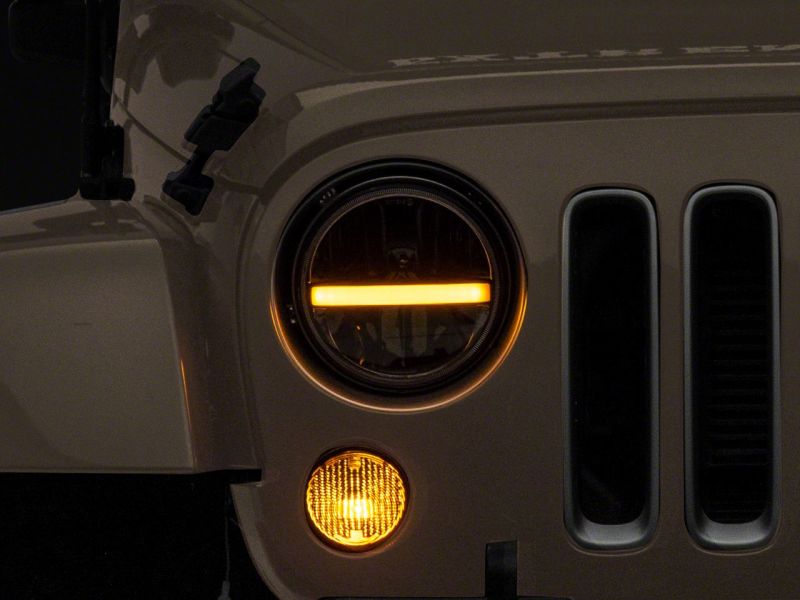 Raxiom J143372 - RAXJ143372 - Raxiom 97-18 Jeep Wrangler TJ & JK Axial 7-In LED Headlights w/ DRL - Black Housing (Clear Lens) - Shipped in Europe - Tuningsupply.com