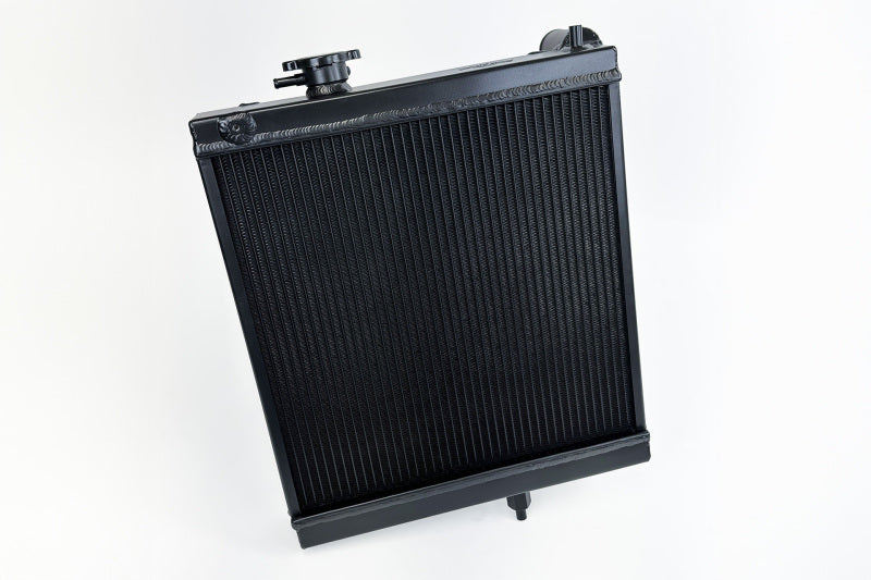 CSF 7228B - CSF7228B - CSF 03-07 Mitsubishi Lancer EVO 7/8/9 1/2 Size Radiator - Black - Shipped in Europe - Tuningsupply.com