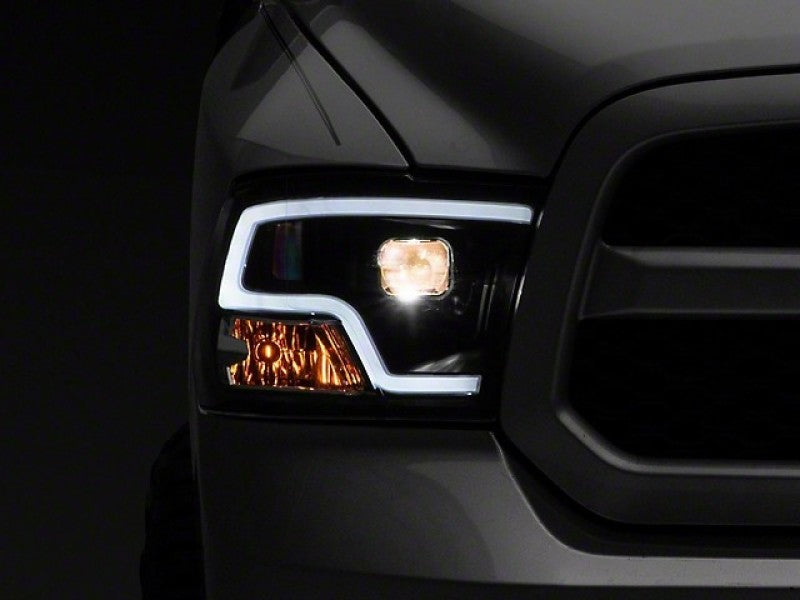 Raxiom R111516 - RAXR111516 - Raxiom 09-18 RAM 1500 LED Halo Projector Headlights- Black Housing (Clear Lens) - Shipped in Europe - Tuningsupply.com