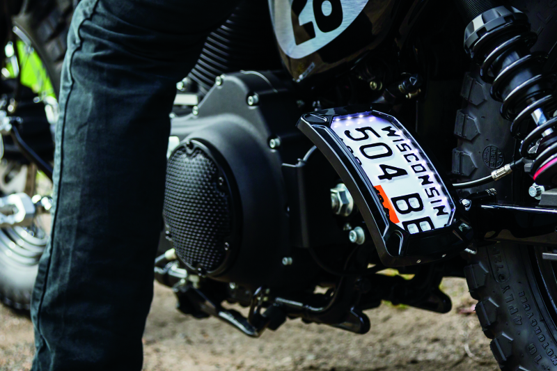 Kuryakyn 3191 - KUR3191 - Kuryakyn Nova Curved Vertical Mount Side License Plate Holder Gloss Black - Shipped in Europe - Tuningsupply.com