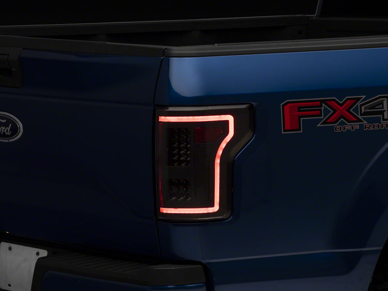 Raxiom T544625 - RAXT544625 - Raxiom 15-17 Ford F-150 LED Tail Lights w/ SEQL Turn Signals- Black Housing (Clear Lens) - Shipped in Europe - Tuningsupply.com
