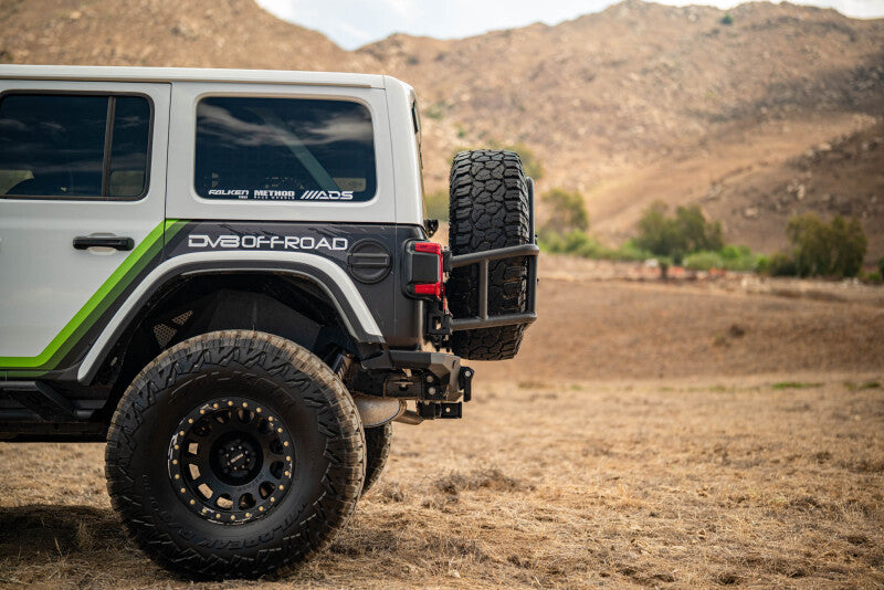 DV8 Offroad TCJL-14 - DVETCJL-14 - DV8 18-25 Jeep Wrangler JL Body Mounted Tire Carrier - Shipped in Europe - Tuningsupply.com