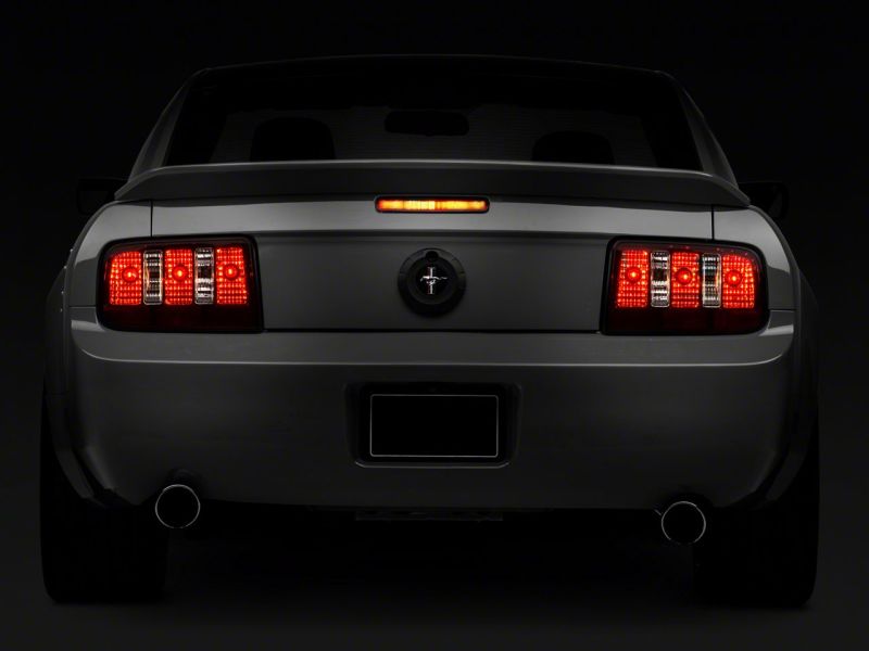 Raxiom 49117 - RAX49117 - Raxiom 05-09 Ford Mustang Coyote Tail Lights- Black Housing (Smoked Lens) - Shipped in Europe - Tuningsupply.com