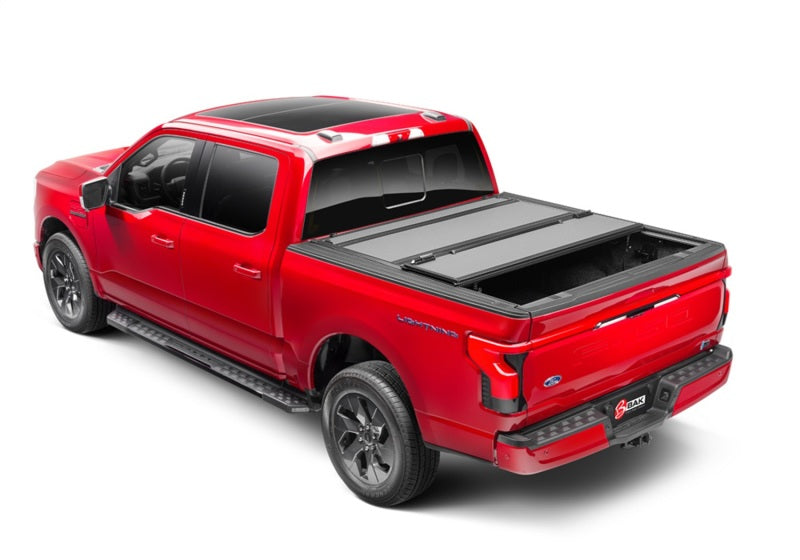 BAK - BAK448339 - BAK 21-22 Ford F-150 (Incl. 2022 Lightning) BAKFlip MX4 5.7ft Bed Cover - Matte Finish - Shipped in Europe - Tuningsupply.com