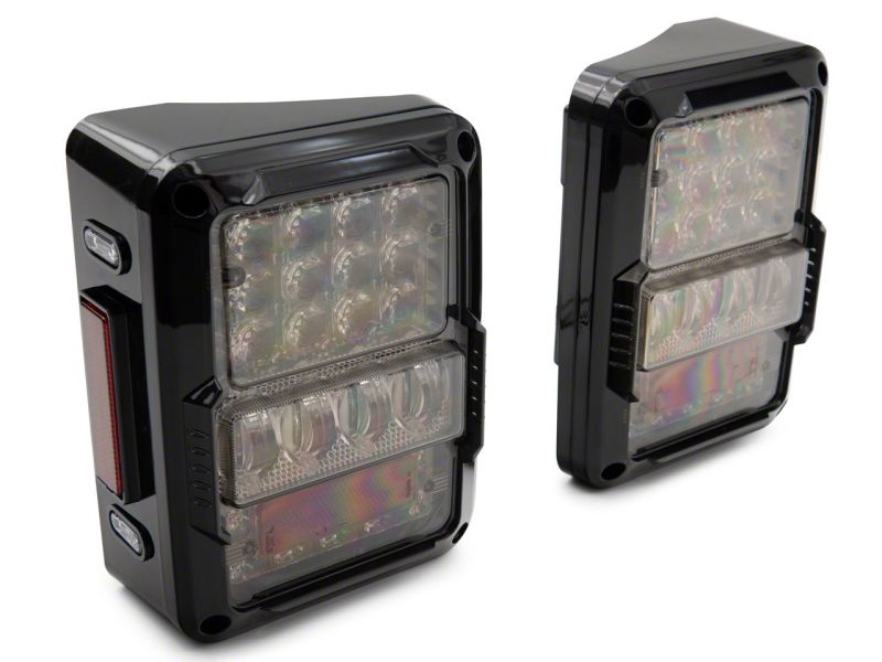 Raxiom J141596 - RAXJ141596 - Raxiom 07-18 Jeep Wrangler JK Axial Series Lux LED Tail Lights- Black Housing (Clear Lens) - Shipped in Europe - Tuningsupply.com