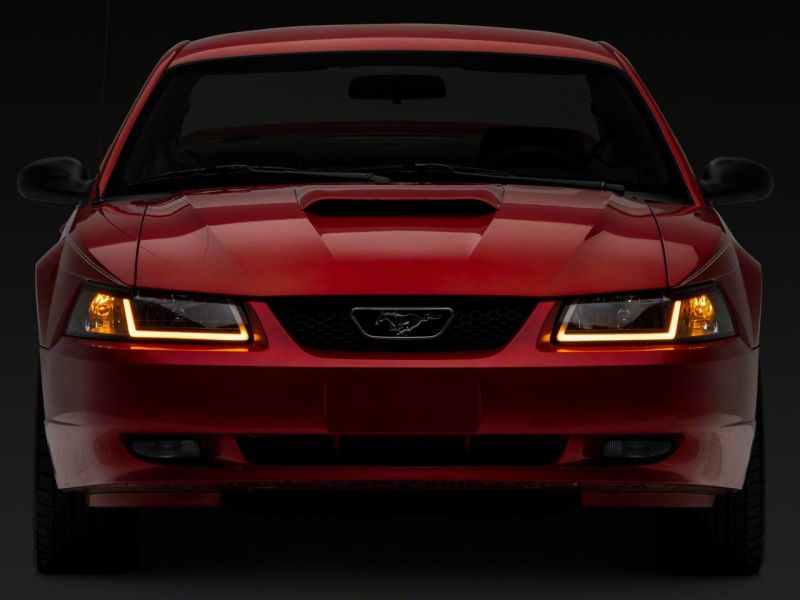 Raxiom 422713 - RAX422713 - Raxiom 99-04 Ford Mustang Axial Series Headlights w/ Sequential LED Bar- Black Housing (Clear Lens) - Shipped in Europe - Tuningsupply.com