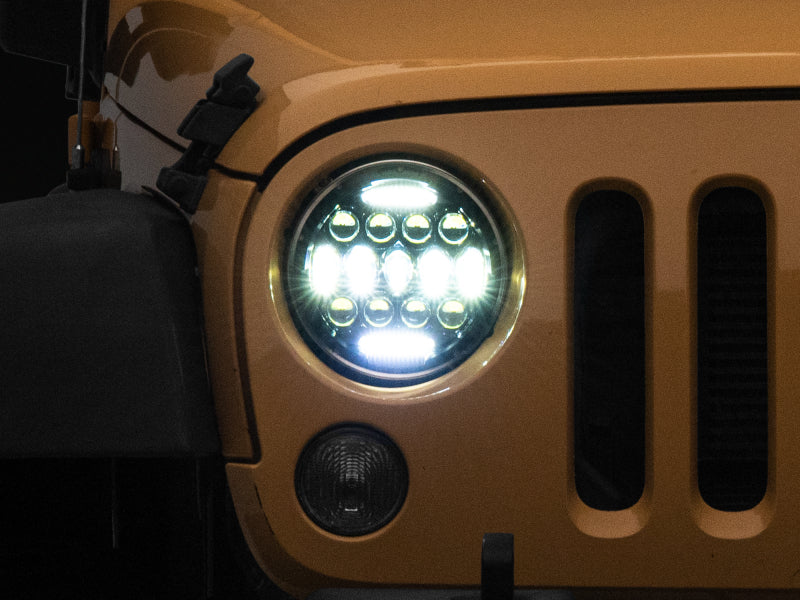 Raxiom J150093 - RAXJ150093 - Raxiom 97-18 Jeep Wrangler TJ/JK Axial Series 13-LED Headlights- Black Housing (Clear Lens) - Shipped in Europe - Tuningsupply.com
