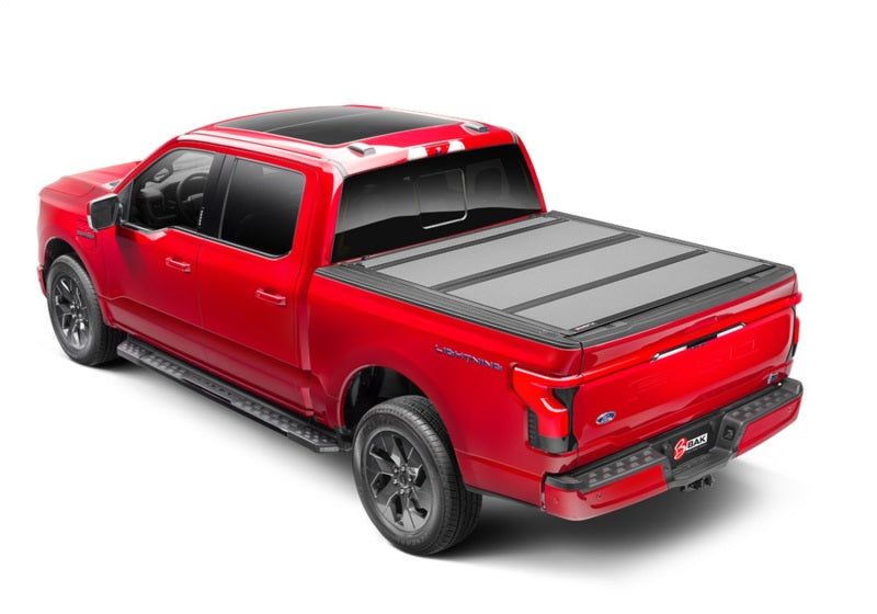 BAK - BAK448339 - BAK 21-22 Ford F-150 (Incl. 2022 Lightning) BAKFlip MX4 5.7ft Bed Cover - Matte Finish - Shipped in Europe - Tuningsupply.com