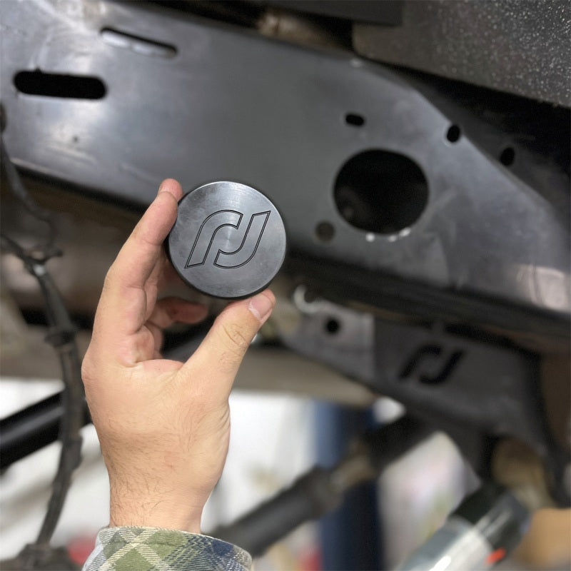 RockJock RJ-600000-103 - ROKRJ-600000-103 - RockJock JL/JT Frame Rail Plugs Frame Behind Front Axle Centerline CNC Machined Black Delrin - Shipped in Europe - Tuningsupply.com