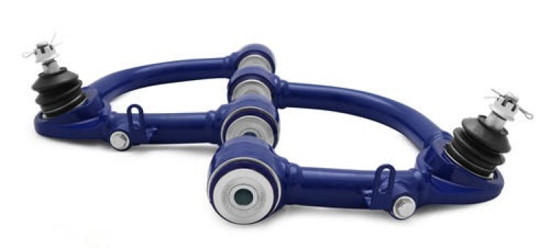 Superpro TRC6720 - SPRTRC6720 - SuperPro Toyota Land Cruiser 100 Series Front Upper Fixed Offset Control Arm Set - Shipped in Europe - Tuningsupply.com
