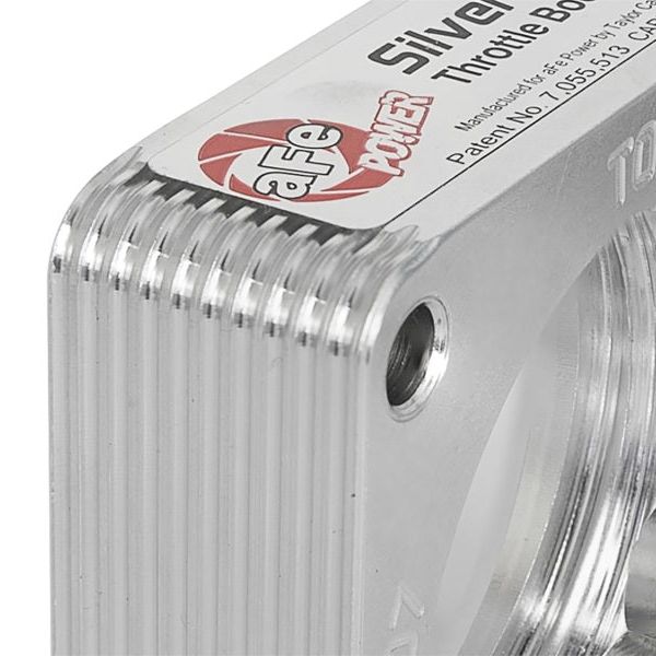 aFe 46-36008 - AFE46-36008 - aFe Silver Bullet Throttle Body Spacer 03-06 Nissan 350Z V6 3.5L (VQ35DE) - Shipped in Europe - Tuningsupply.com