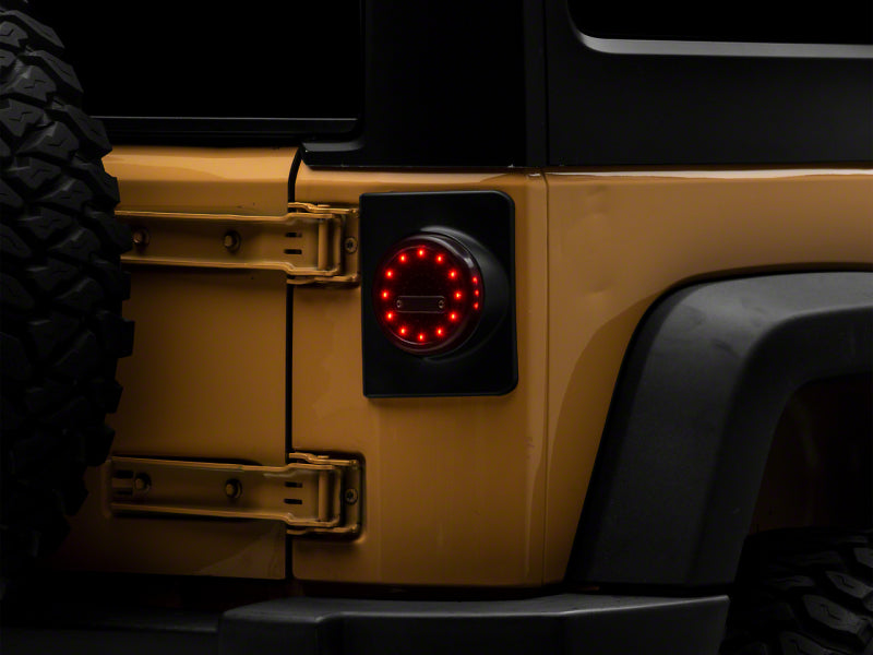 Raxiom J164240 - RAXJ164240 - Raxiom 07-18 Jeep Wrangler JK Axial Series Halo LED Tail Lights- Black Housing (Clear Lens) - Shipped in Europe - Tuningsupply.com