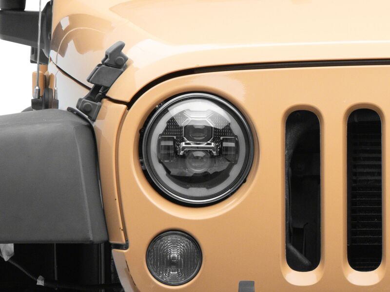 Raxiom J178741 - RAXJ178741 - Raxiom 07-18 Jeep Wrangler Axial Series 7-Inch LED Headlights w DRL/ Black Housing - Clear Lens - Shipped in Europe - Tuningsupply.com