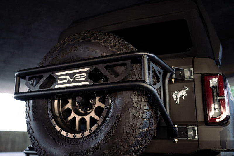 DV8 Offroad - DVETCBR-01 - DV8 Offroad 21-23 Ford Bronco Spare Tire Guard & Accessory Mount - Shipped in Europe - Tuningsupply.com