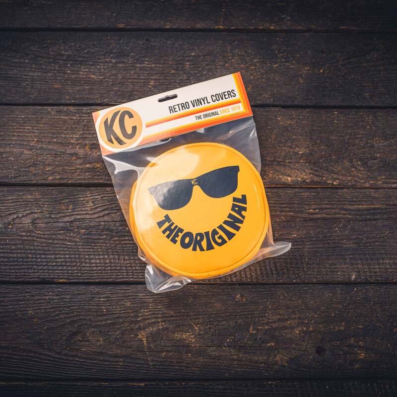 KC HiLiTES 5205 - KCL5205 - KC HiLiTES Retro 6in Round Yellow Vinyl Light Cover w/ Black KC Sunglasses Logo - Shipped in Europe - Tuningsupply.com