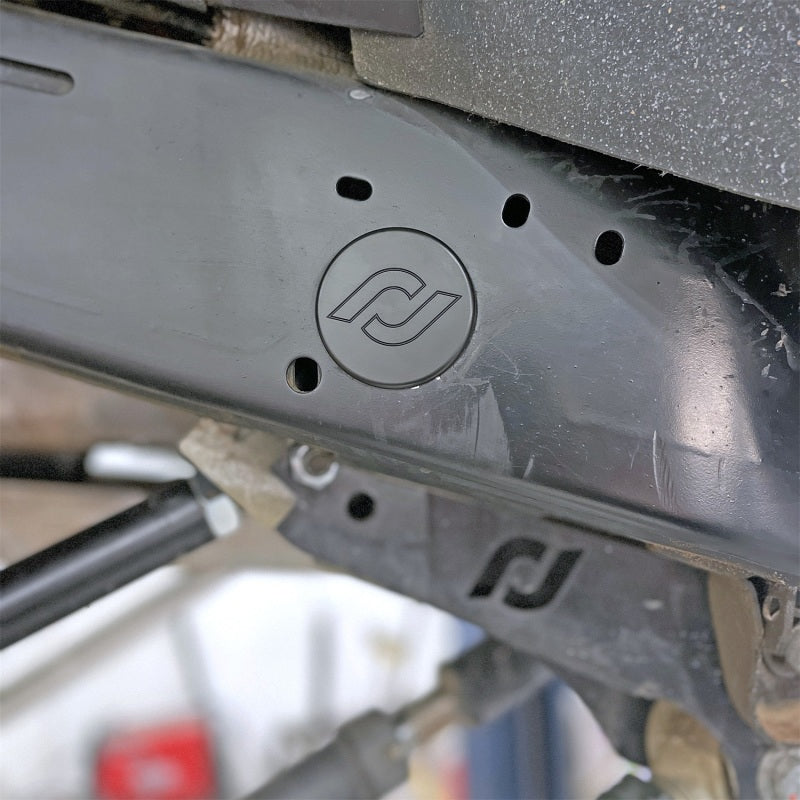 RockJock RJ-600000-103 - ROKRJ-600000-103 - RockJock JL/JT Frame Rail Plugs Frame Behind Front Axle Centerline CNC Machined Black Delrin - Shipped in Europe - Tuningsupply.com