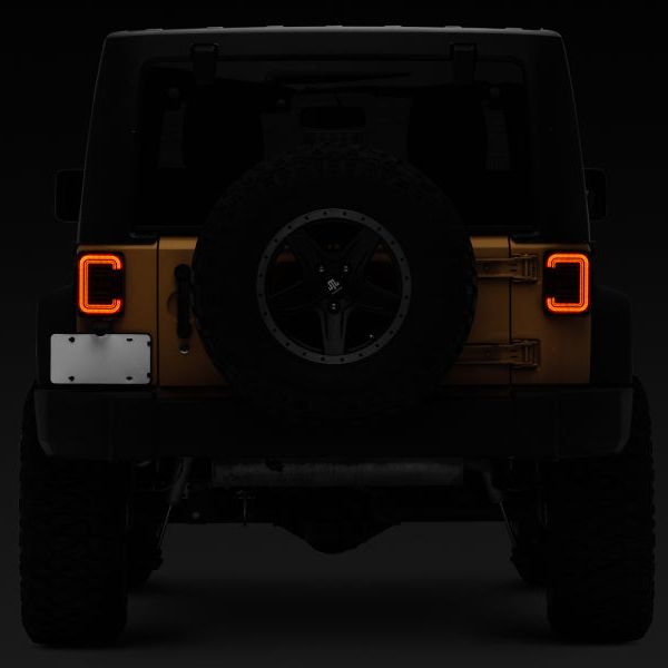 Raxiom J138358 - RAXJ138358 - Raxiom 07-18 Jeep Wrangler JK Axial Series LED Halo Tail Lights- Black Housing (Dark Smoked Lens) - Shipped in Europe - Tuningsupply.com