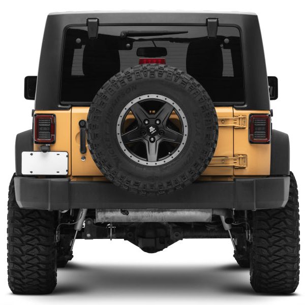 Raxiom J138358 - RAXJ138358 - Raxiom 07-18 Jeep Wrangler JK Axial Series LED Halo Tail Lights- Black Housing (Dark Smoked Lens) - Shipped in Europe - Tuningsupply.com
