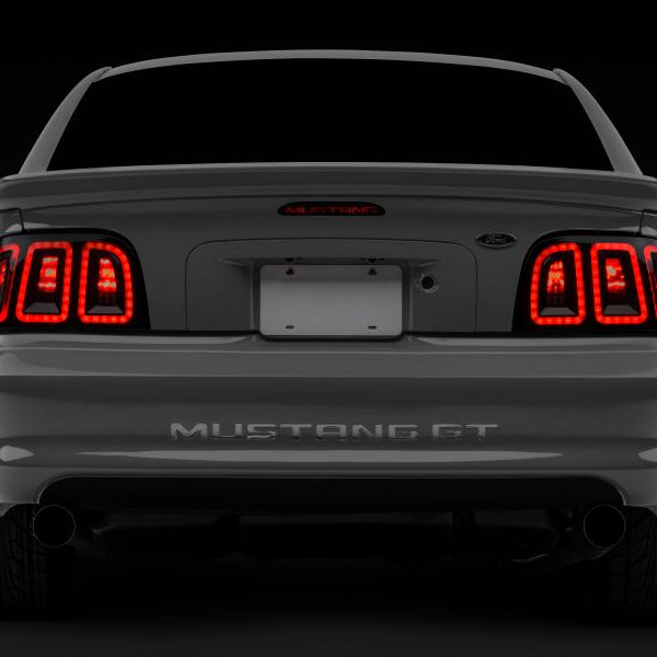 Raxiom 389876 - RAX389876 - Raxiom 96-98 Ford Mustang Icon LED Tail Lights- Black Housing (Smoked Lens) - Shipped in Europe - Tuningsupply.com