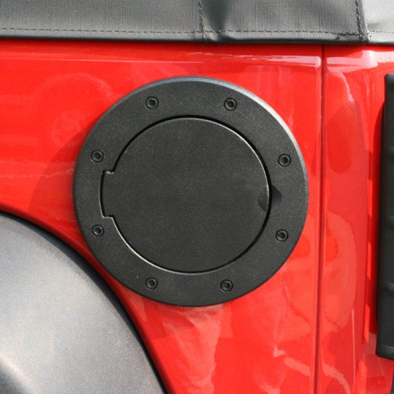Rugged Ridge 11425.05 - RUG11425.05 - Rugged Ridge Non-Locking Gas Cap Door Black 07-18 Jeep Wrangler - Shipped in Europe - Tuningsupply.com