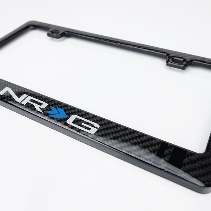 NRG CARB-P200NRG - NRGCARB-P200NRG - NRG Carbon License Plate Frame/ Fiber Poly Dip Finish Wet w/ NRG Logo - Shipped in Europe - Tuningsupply.com
