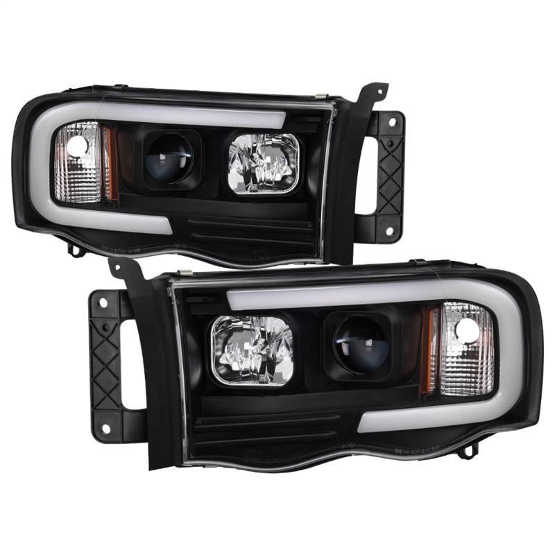 SPYDER 5084606 - SPY5084606 - Spyder 02-05 Dodge Ram 1500 Light Bar Projector Headlights - Black (PRO-YD-DR02V2-LB-BK) - Shipped in Europe - Tuningsupply.com