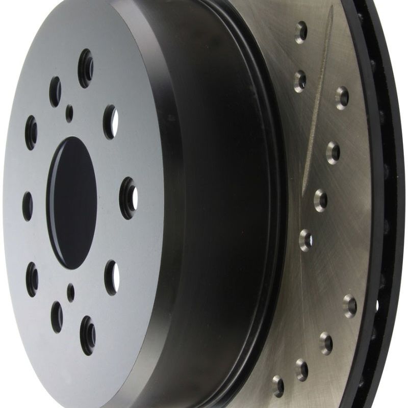 Stoptech 127.44105L - STO127.44105L - StopTech 5/93-98 Toyota Supra Left Rear Slotted & Drilled Rotor - Shipped in Europe - Tuningsupply.com