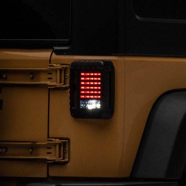 Raxiom J115435 - RAXJ115435 - Raxiom 07-18 Jeep Wrangler JK LED Tail Lights- Black Housing (Smoked Lens) - Shipped in Europe - Tuningsupply.com
