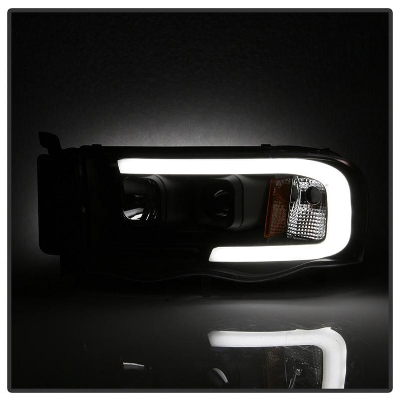 SPYDER 5084606 - SPY5084606 - Spyder 02-05 Dodge Ram 1500 Light Bar Projector Headlights - Black (PRO-YD-DR02V2-LB-BK) - Shipped in Europe - Tuningsupply.com