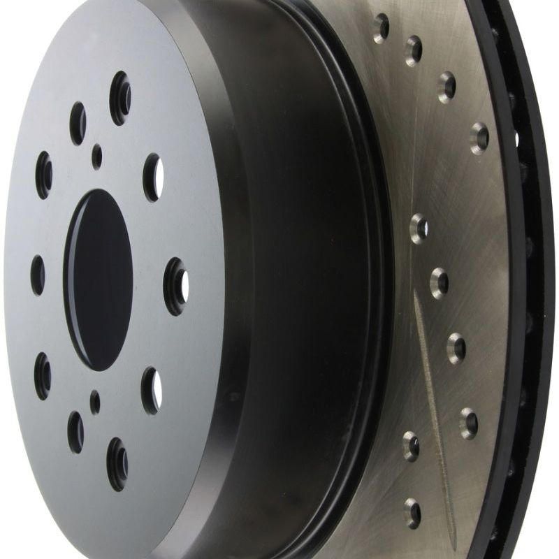 Stoptech 127.44105R - STO127.44105R - StopTech 5/93-98 Toyota Supra Right Rear Slotted & Drilled Rotor - Shipped in Europe - Tuningsupply.com