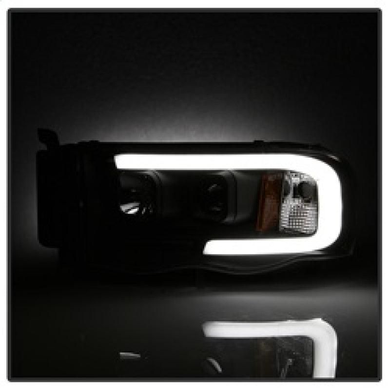 SPYDER 5084606 - SPY5084606 - Spyder 02-05 Dodge Ram 1500 Light Bar Projector Headlights - Black (PRO-YD-DR02V2-LB-BK) - Shipped in Europe - Tuningsupply.com
