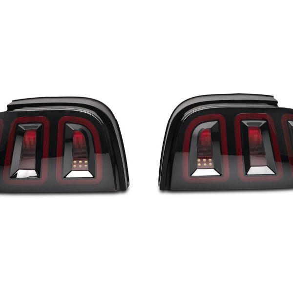 Raxiom 389876 - RAX389876 - Raxiom 96-98 Ford Mustang Icon LED Tail Lights- Black Housing (Smoked Lens) - Shipped in Europe - Tuningsupply.com