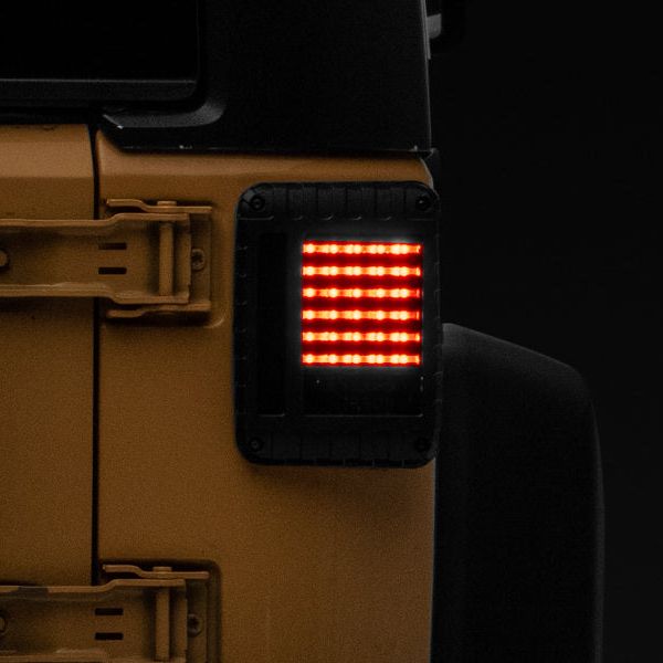 Raxiom J115435 - RAXJ115435 - Raxiom 07-18 Jeep Wrangler JK LED Tail Lights- Black Housing (Smoked Lens) - Shipped in Europe - Tuningsupply.com