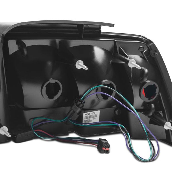 Raxiom 100807 - RAX100807 - Raxiom 99-04 Ford Mustang Excluding 99-01 Cobra Icon LED Tail Lights- Black Housing (Smoked Lens) - Shipped in Europe - Tuningsupply.com