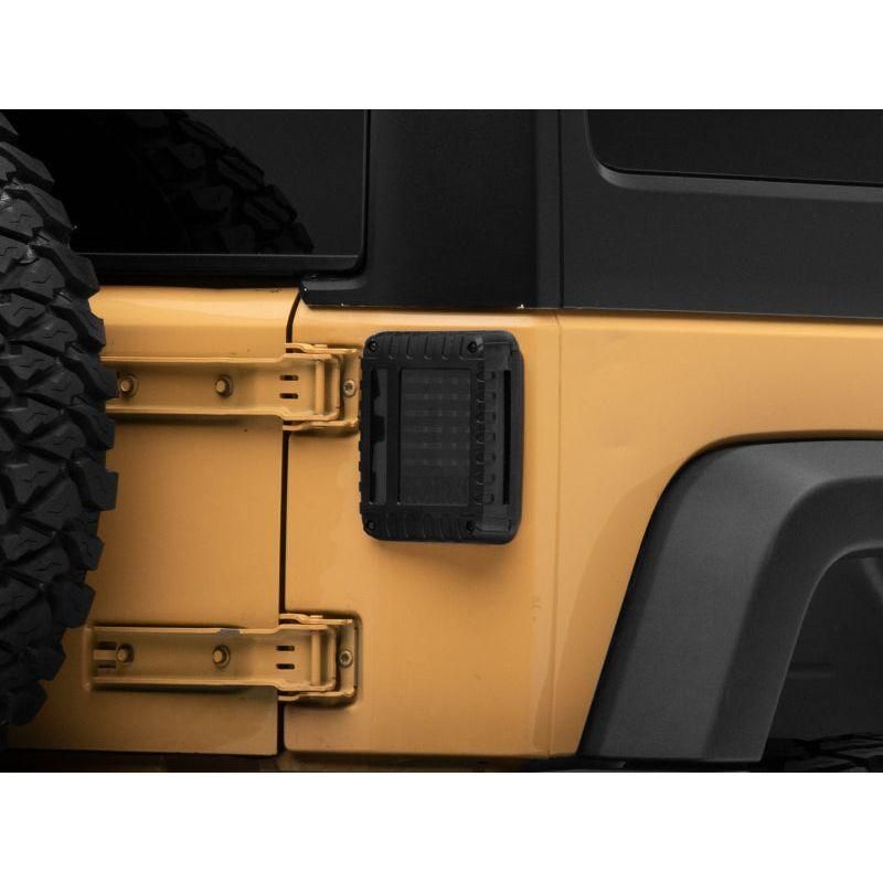 Raxiom J115435 - RAXJ115435 - Raxiom 07-18 Jeep Wrangler JK LED Tail Lights- Black Housing (Smoked Lens) - Shipped in Europe - Tuningsupply.com