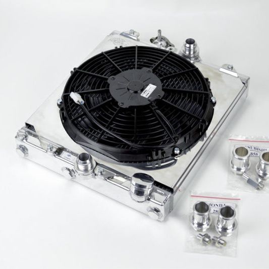 CSF 2858X - CSF2858X - CSF Universal Half Radiator w/-16AN & Slip-On Fittings/12in SPAL Fan & Shroud - Shipped in Europe - Tuningsupply.com