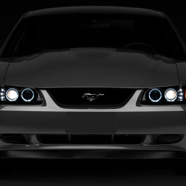 Raxiom 49113 - RAX49113 - Raxiom 99-04 Ford Mustang Dual LED Halo Projector Headlights- Black Housing (Smoked Lens) - Shipped in Europe - Tuningsupply.com