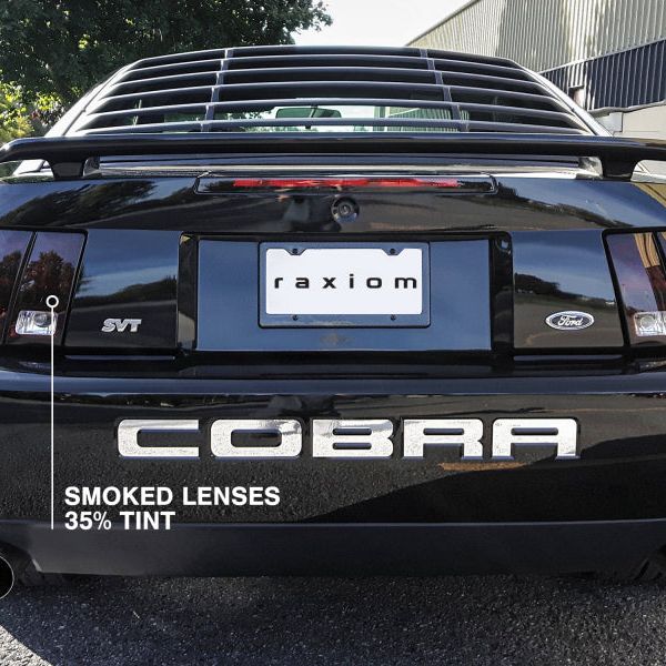 Raxiom 49080 - RAX49080 - Raxiom 99-04 Ford Mustang Excluding 99-01 Cobra Tail Lights- Black Housing (Smoked Lens) - Shipped in Europe - Tuningsupply.com
